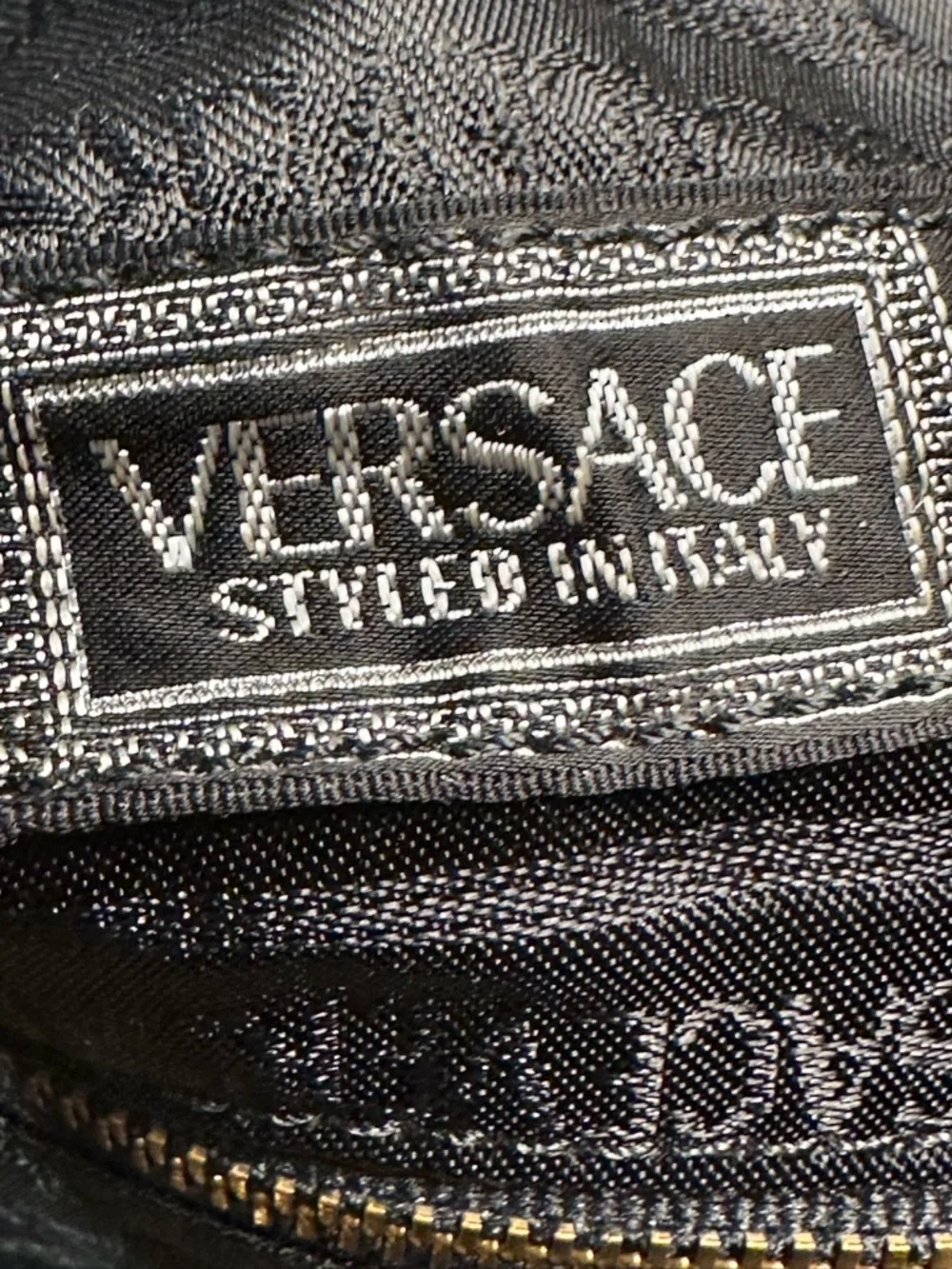 Versace Unisex Black Leather Duffel with Gold Medallion